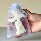 Vela Cruz con Niño en bolsa de organza