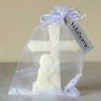 Vela Cruz con Niño en bolsa de organza